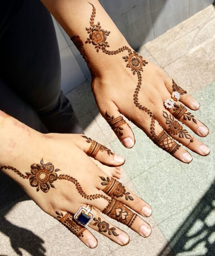 Leafy trails and intricate patterns on fingers Arabic Mehndi 8